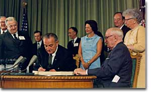 President Lyndon Johnson signing the Medicare program into law