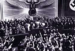 Hitler announces acquisition of Austria, 1938