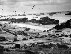 ships, planes and troops invading Normandy