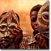 Ghanaian boys with traditional masks
