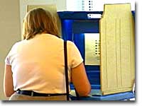 Woman at voting booth