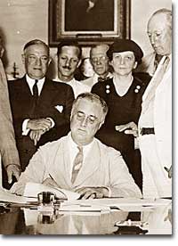 President Roosevelt signing Social Security Act